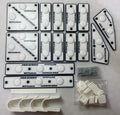Collection of white DCP Products pro-series parts on a white background